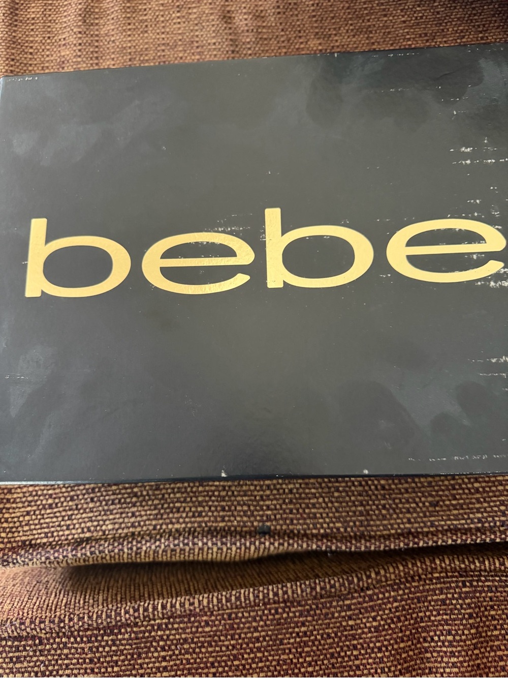bebe Black Box with Gold Logo